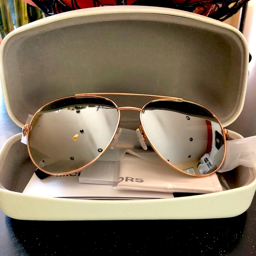Brand new never worn Michael Kors sunglasses.